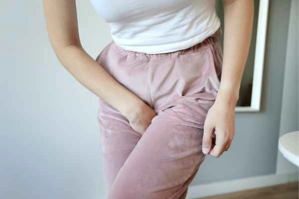 older woman running to the toilet because of urinary incontinence Epping