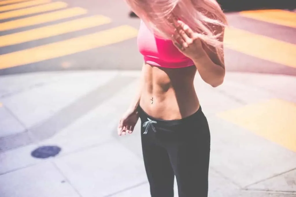 Woman with toned stomach after LA-EMS Body Sculpting Treatment Epping